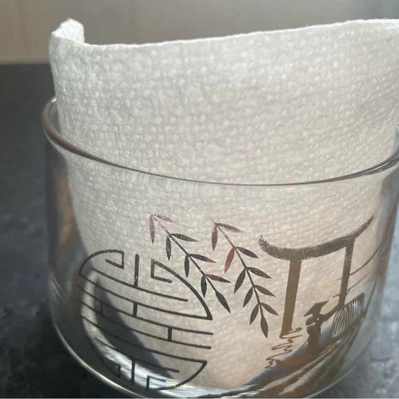 Round clear glass trinket jar with a lid, adorned with gold Asian symbols - Picture 8 of 9